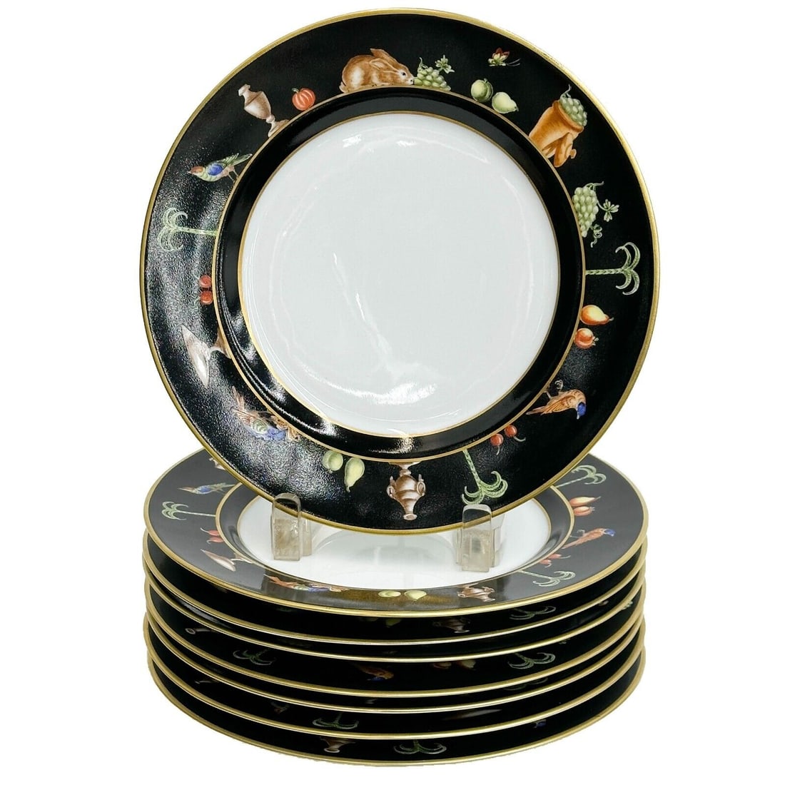 8 Tiffany Le Tallec Private Stock Porcelain Luncheon Plates Black Shoulder: 8 Tiffany Le Tallec Private Stock Porcelain luncheon plates in Black Shoulder. A black ground decorated with rabbits, birds, and fruits around the rim. Underside with Tiffany Private Stock marks. Weig