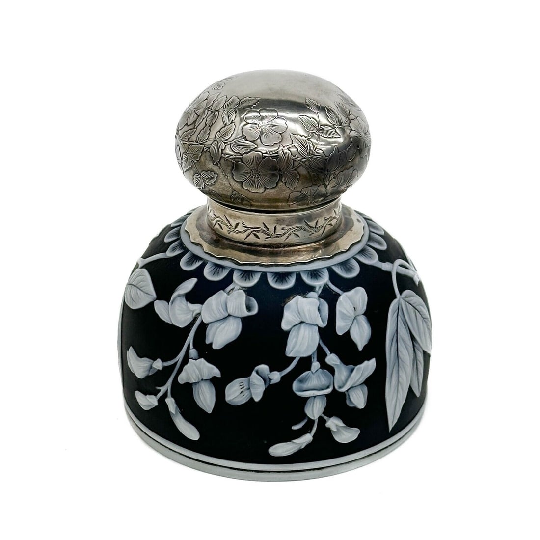 Gorham Sterling Silver Mounted Cameo Art Glass Inkwell Thomas Webb circa 1890: Gorham Sterling Silver Mounted Cameo Art Glass Inkwell. Thomas Webb black glass inkwell layered with white leaves, glass unsigned. Silver mount with engraved flowers, back with Gorham silver maker's m