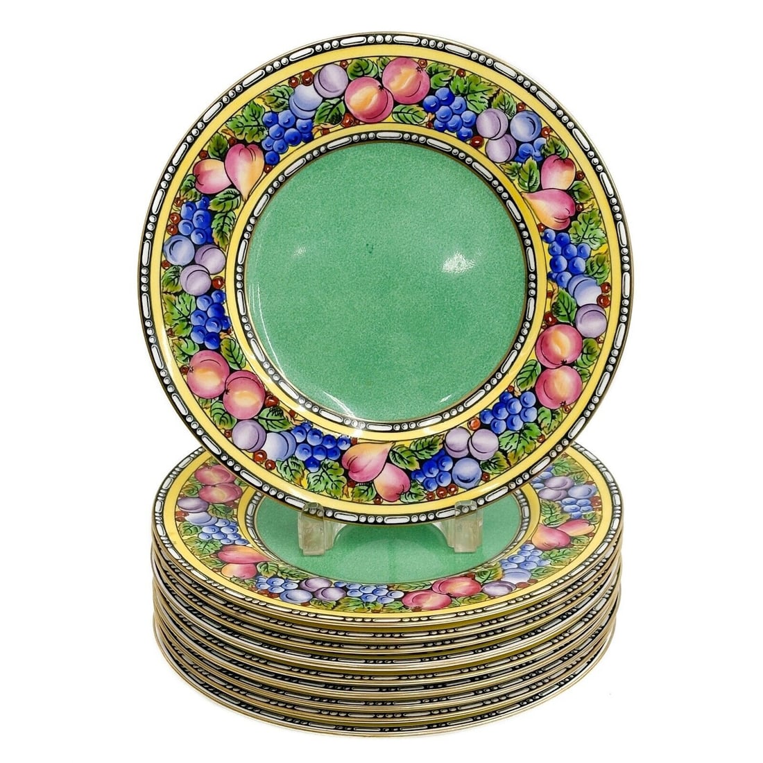 10 Wedgwood England Porcelain Fruit Dinner Plates Green circa 1920: 10 Wedgwood England Porcelain Dinner Plates, circa 1920. A green ground to the center, a yellow ground to the edge decorated with colorful fruits. Underside with Wedgwood marks. Weight: Approx. 14 lbs