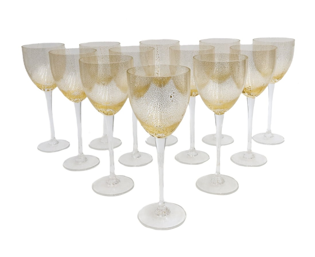 12 Vintage Otto Franek American Gold Fleck Leaf Glass Wine Goblets Signed: 12 Vintage Otto Franek American glass wine goblets. Gold fleck leaf to bowls. Signed "O. Franek" to base. Weight: Approx. 7 lbs Measurements: Approx. 3.25 inches diameter x 8.5 inches tall Domestic S