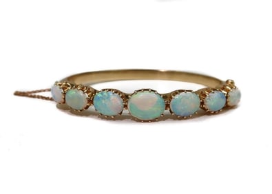 14k Yellow Gold White Opal Bangle Bracelet.