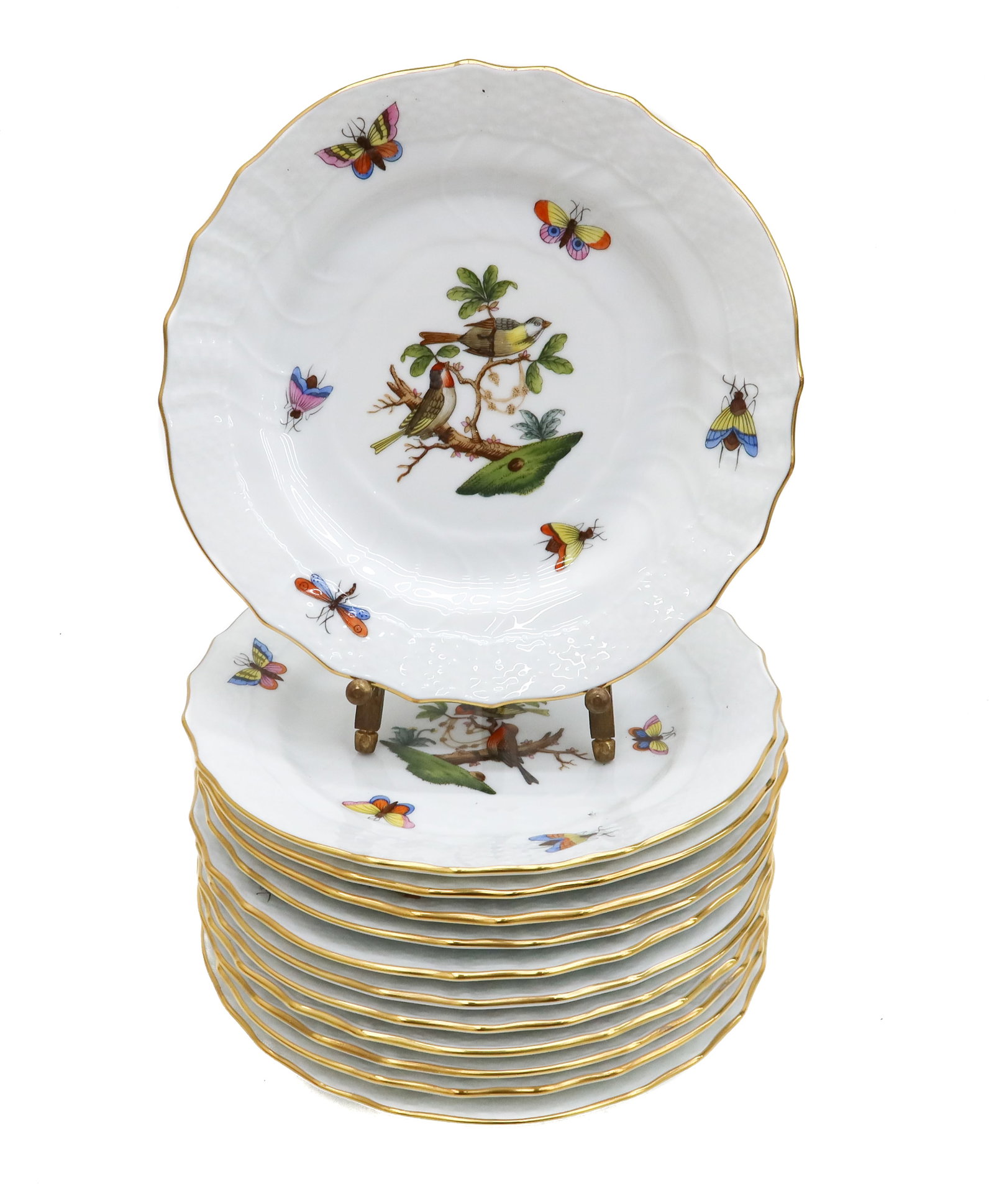 12 Herend Hungary Rothschild Birds Hand Painted Porcelain Bread Plates.: 12 Herend Hungary Rothschild Birds Hand Painted Porcelain Bread Plates. White ground with hand painted birds and insects to basketweave rim. Gilt to rim. Herend marks to underside. Weight Approx., 5 l