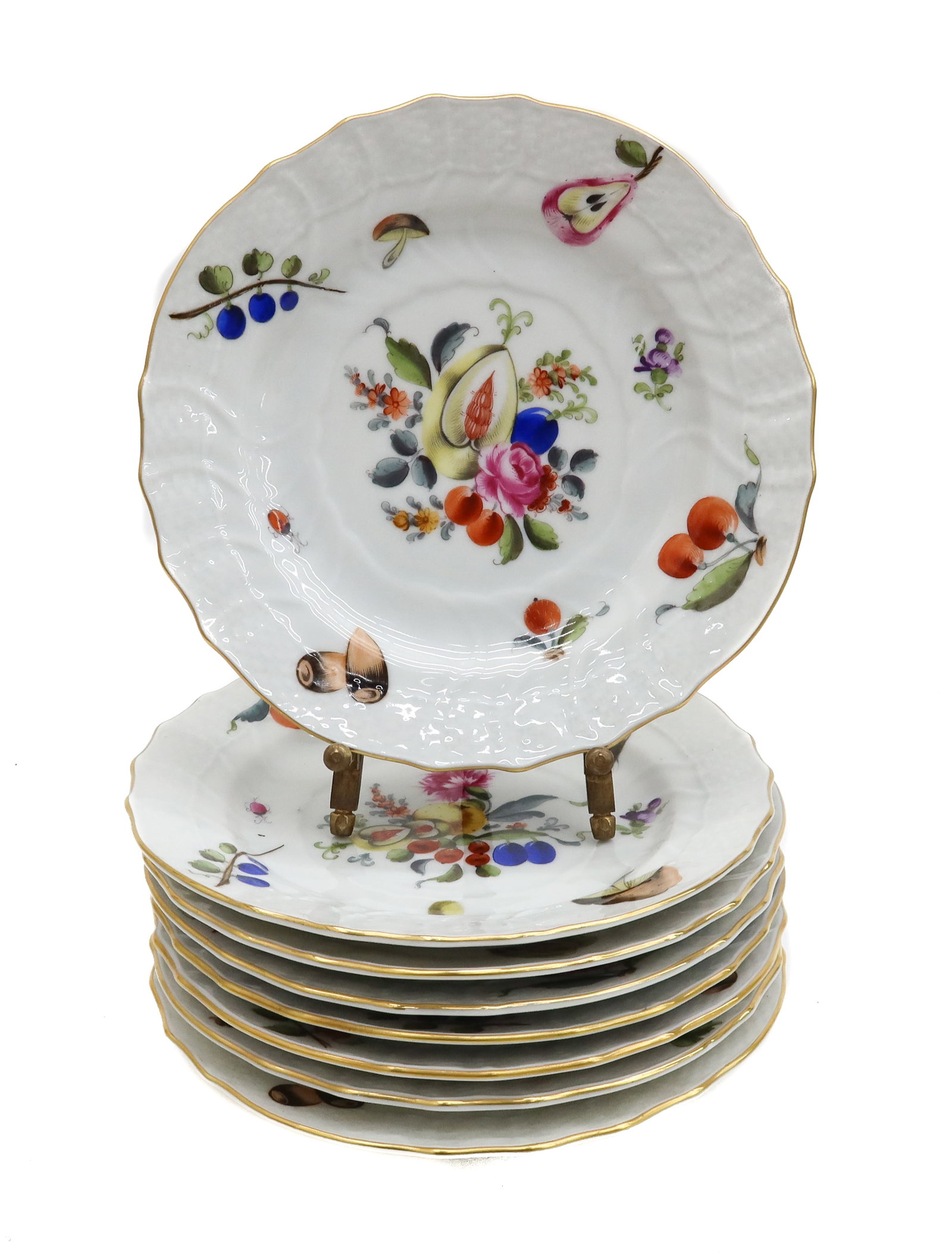 8 Herend Hungary Fruits and Flowers Hand Painted Porcelain Bread Plates: 8 Herend Hungary Fruits and Flowers Hand Painted Porcelain Bread Plates. Hand painted fruits and flowers to center. Basketweave texture to the scalloped rim. Herend Hungary mark to underside. Weight A