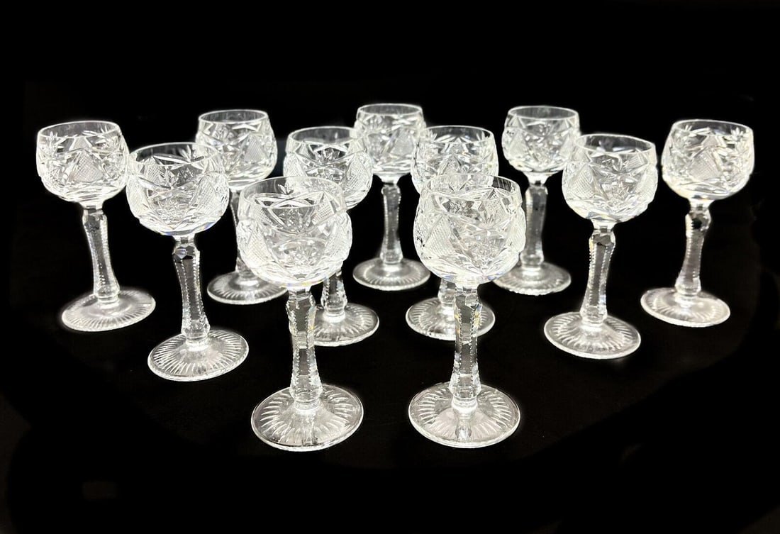 11 Bohemian Diamond Cut Glass Cordial Wine Goblets Attributed to Nachtmann: 11 Bohemian cut glass cordial wine goblets. Diamond cuts to the bowl with a sun-ray base. Unmarked- attributed to Nachtmann. Weight Approx., 1 lb Measures Approx., 1.75 inches x 4 inches tall Domestic