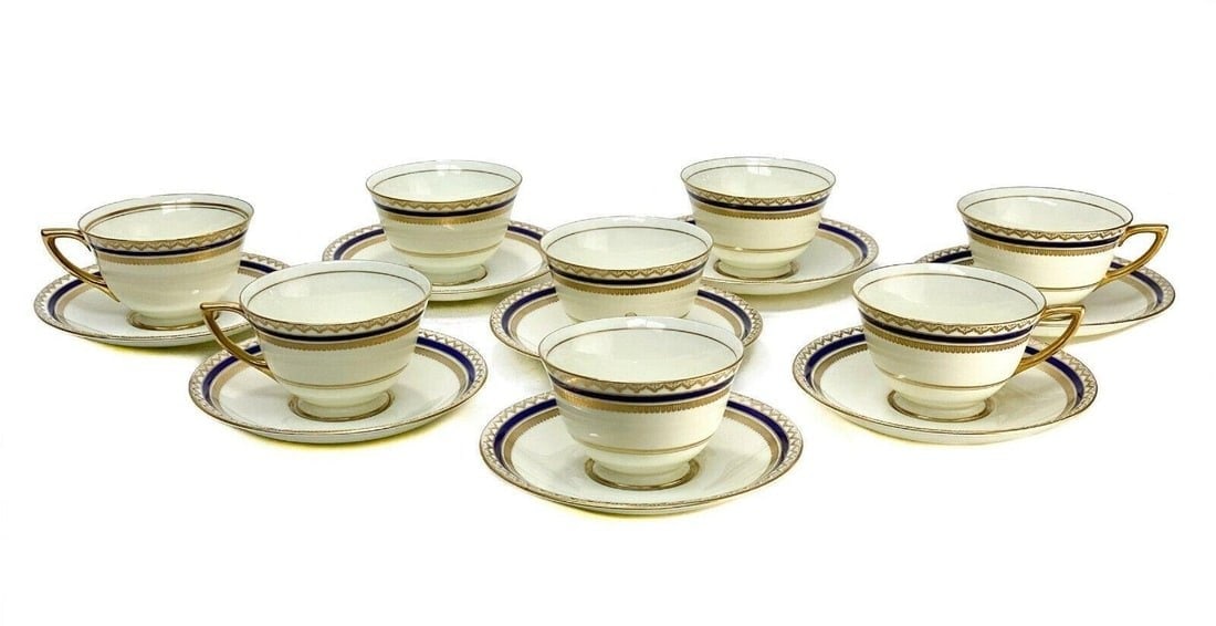8 Royal Doulton England Porcelain Cup and Saucers, circa 1930: 8 Royal Doulton England porcelain cup and saucers, circa 1930. Cobalt blue ground to the rims with gilt geometric designs to the edge. Royal Doulton England marks to the underside base. Weight Approx.