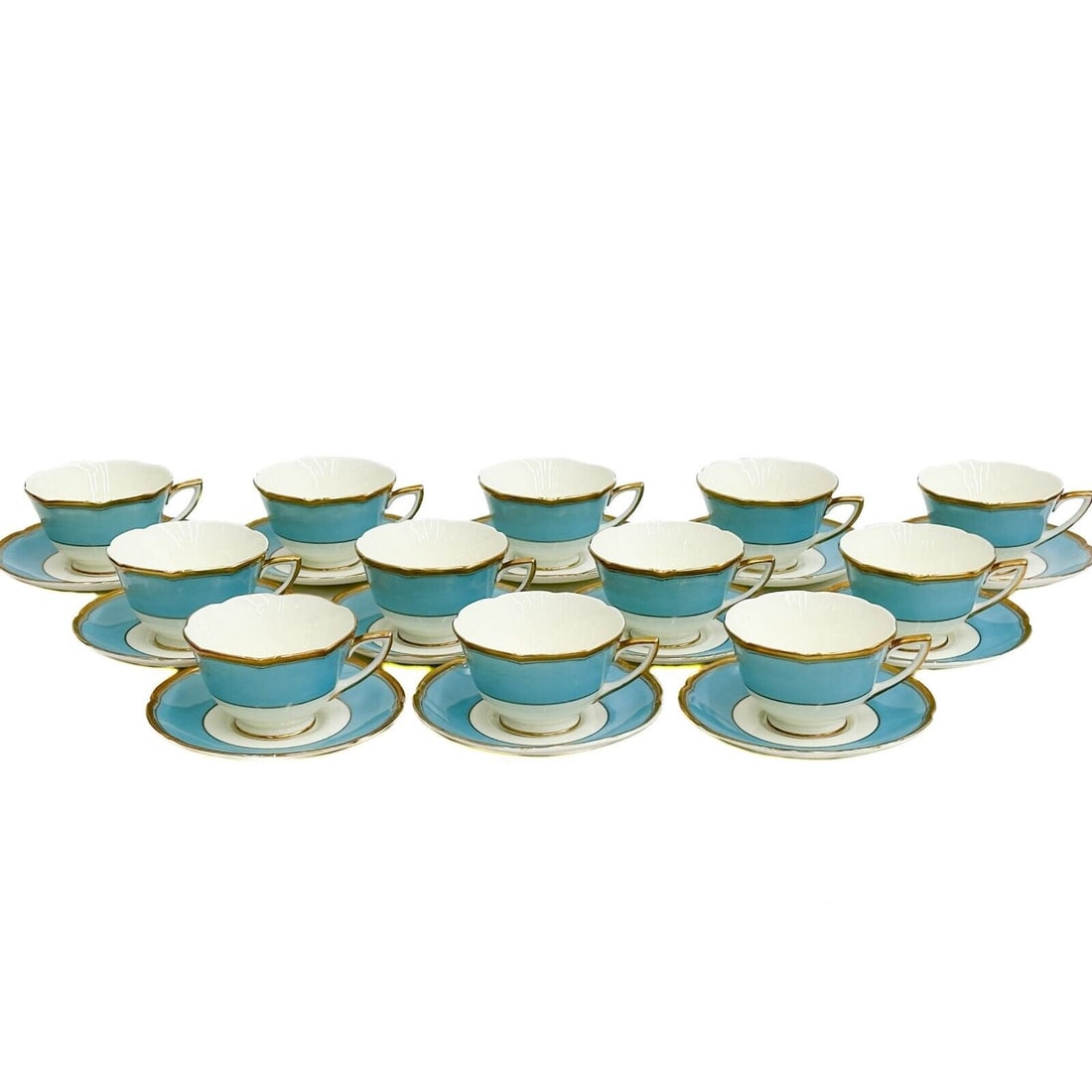 12 Royal Doulton England Porcelain Cup & Saucers Robin's Egg Blue V2259 c. 1940: 12 Royal Doulton England Porcelain Cup & Saucers, circa 1940. A blue ground to the edge, gilt to the scalloped rim. Underside marked Royal Doulton V2259 Weight: Approx. 8 lbs Measurements: Approx. Cup