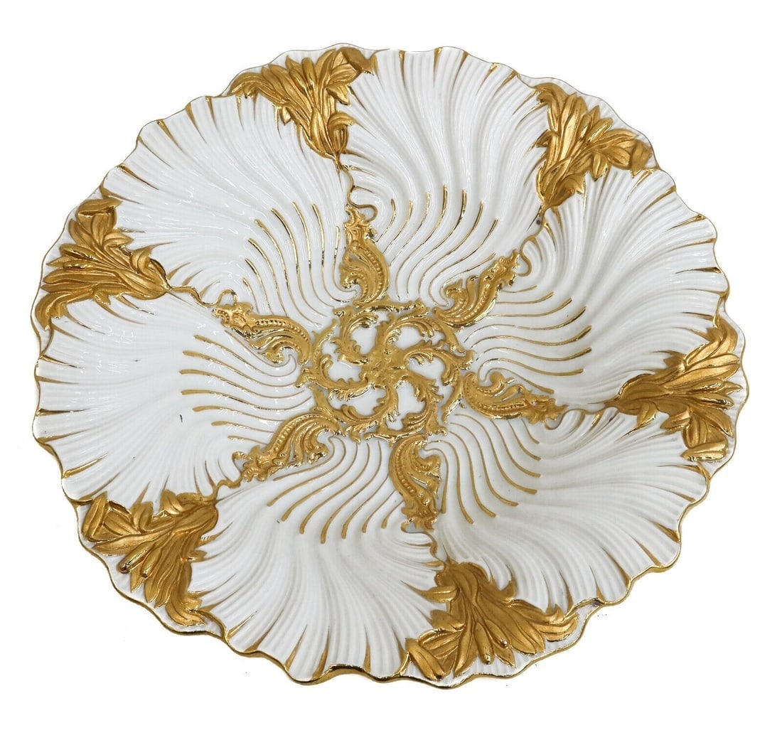 Meissen Germany Porcelain Gilt Scroll Shell Scalloped Deep Bowl circa 1900: Meissen Germany porcelain gilt scroll shell scalloped deep bowl circa 1900. Gilt to the raised leaf and scrolls. Meissen mark to underside. Weight: Approx. 3 lb Measurements: Approx. 11 inches diamete