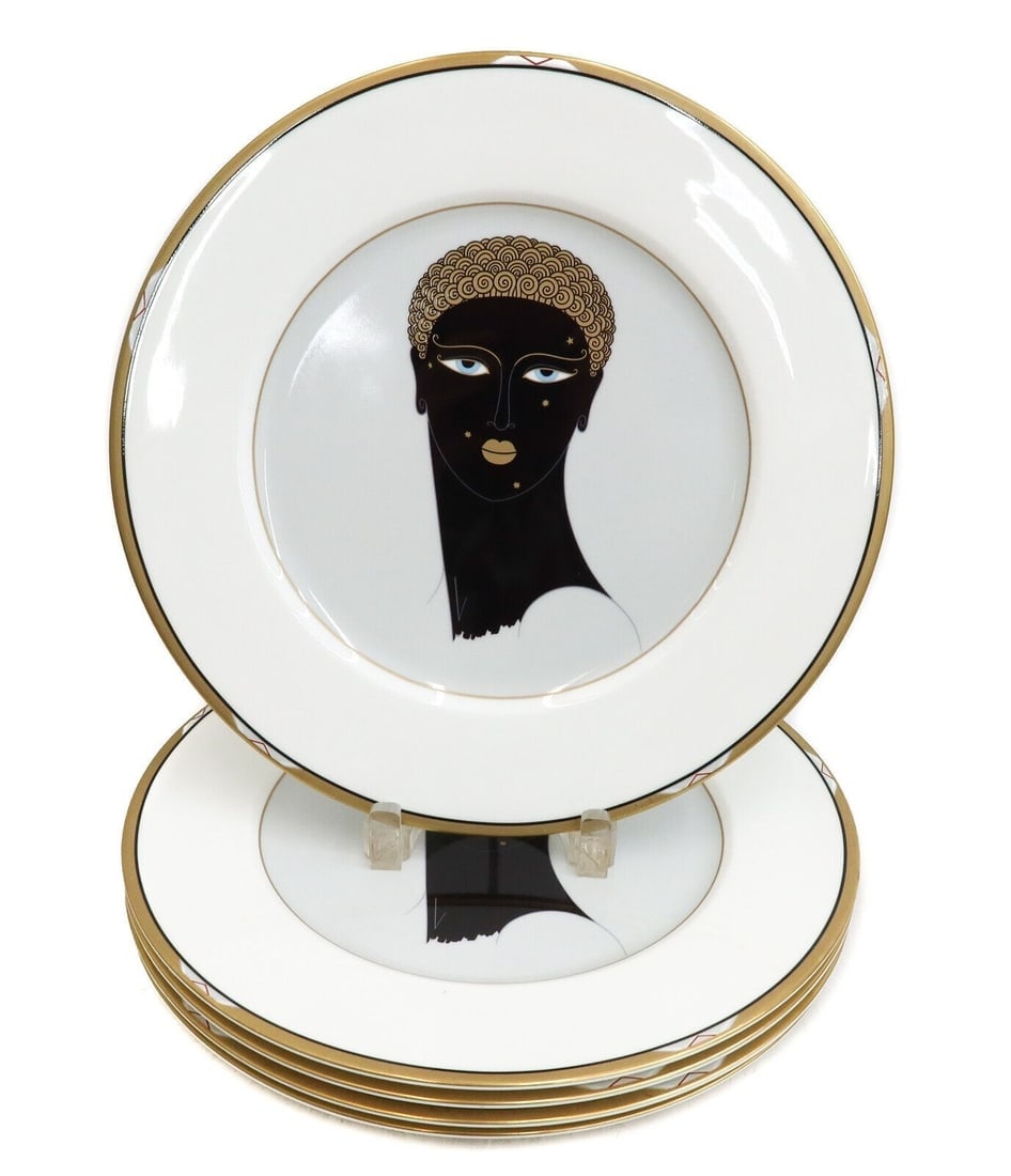 5 Erte Bone China Porcelain 12 inch Chargers in Queen of Sheba Japan 1987: 5 Erte Bone China porcelain 12 inch Chargers in Queen of Sheba Japan. White ground with the center depicting an Art Deco style profile of a beauty with stars to her face. Signed to underside: Erte Que