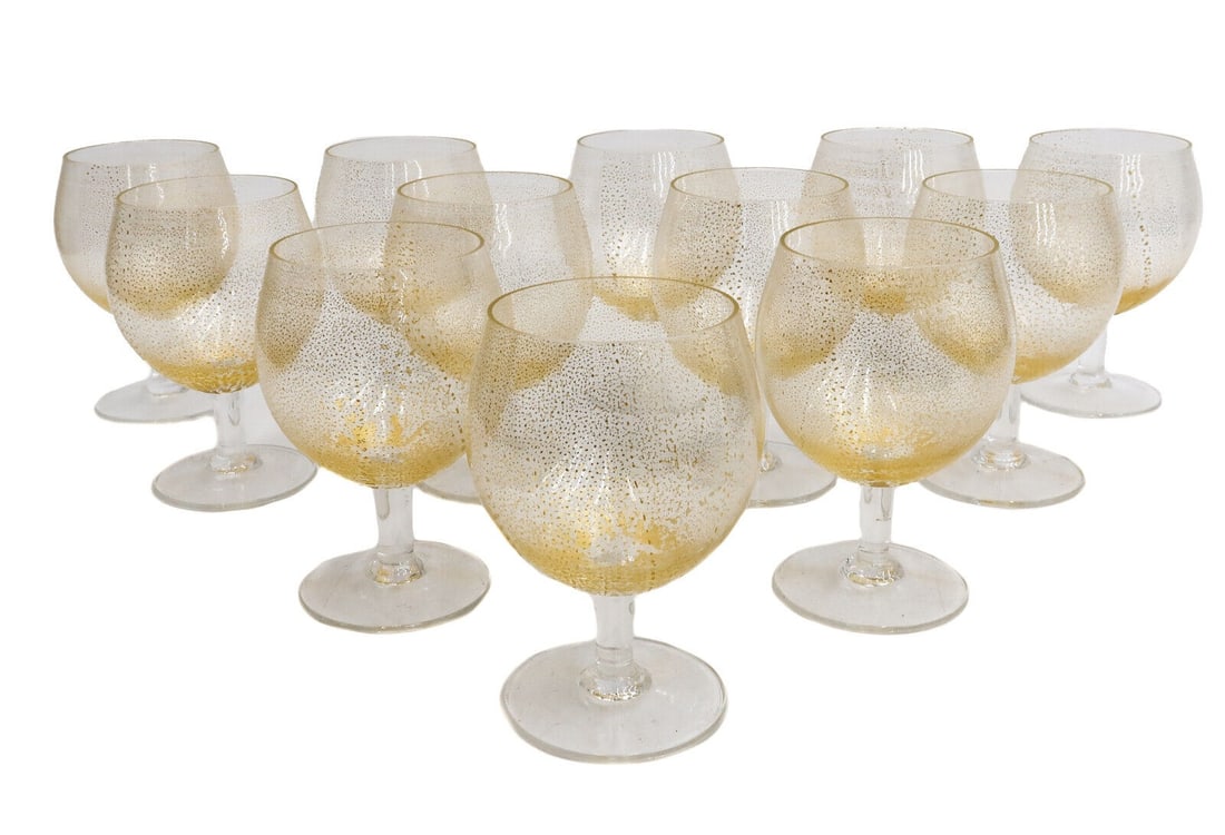 12 Vintage Otto Franek American Gold Fleck Leaf Glass Brandy Goblets Signed: 12 Vintage Otto Franek American glass brandy goblets. Gold fleck leaf to bowls. Signed "O. Franek" to baseWeight: Approx. 7 lbs Measurements: Approx. 3.5 inches diameter x 5 inches tall Domestic Ship