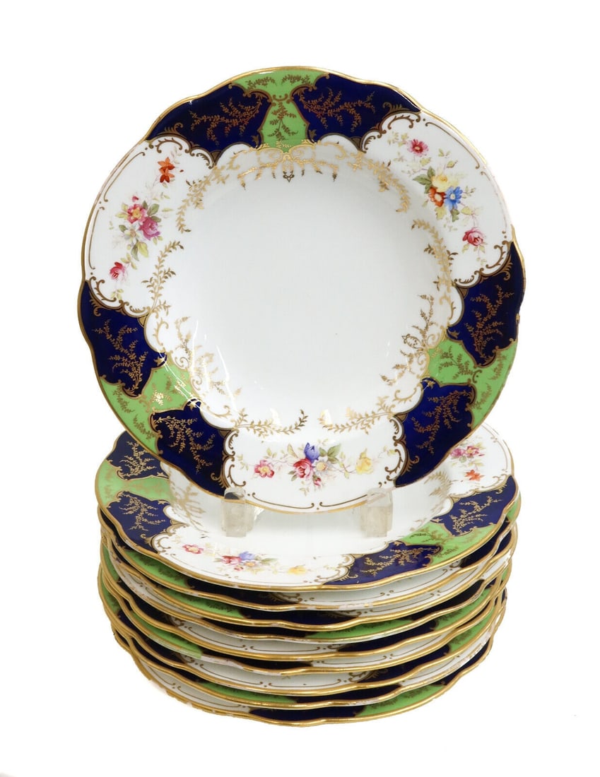 10 Coalport England Porcelain Cobalt Blue & Gilt Batwing Rimmed Soup Bowls c1890: 10 Coalport England porcelain cobalt blue & gilt batwing rimmed soup bowls circa 1890. Cobalt blue with green and gilt batwing pattern and hand painted florals to rim. Coalport England mark to undersi