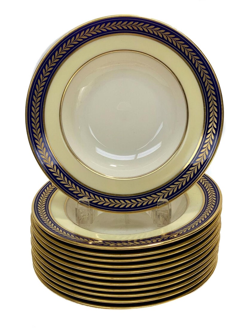 12 Lenox Porcelain Rimmed Soup Bowls, circa 1960: 12 Lenox porcelain rimmed soup, circa 1960. A cobalt blue ground with gilt Empire wreaths around the edge. Lenox porcelain marks to the underside. Weight Approx., 14 lbs Measures Approx., 8.25 inches 