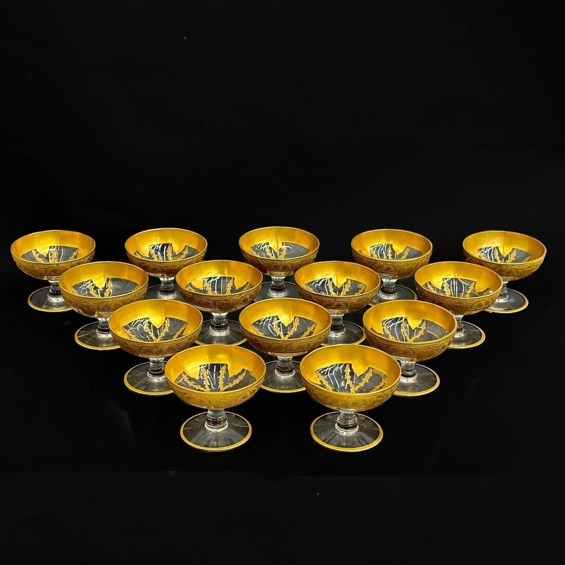 14 European Gilt Glass Aperitif Glasses Vintage: 14 European Gilt Glass aperitif Glasses, vintage. Clear glass with orate gilt decoration. Weight: Approx. 1.5 lbs Measurements: Approx. 2.5 inches diameter x 1.75 inches Condition: Great condition, li