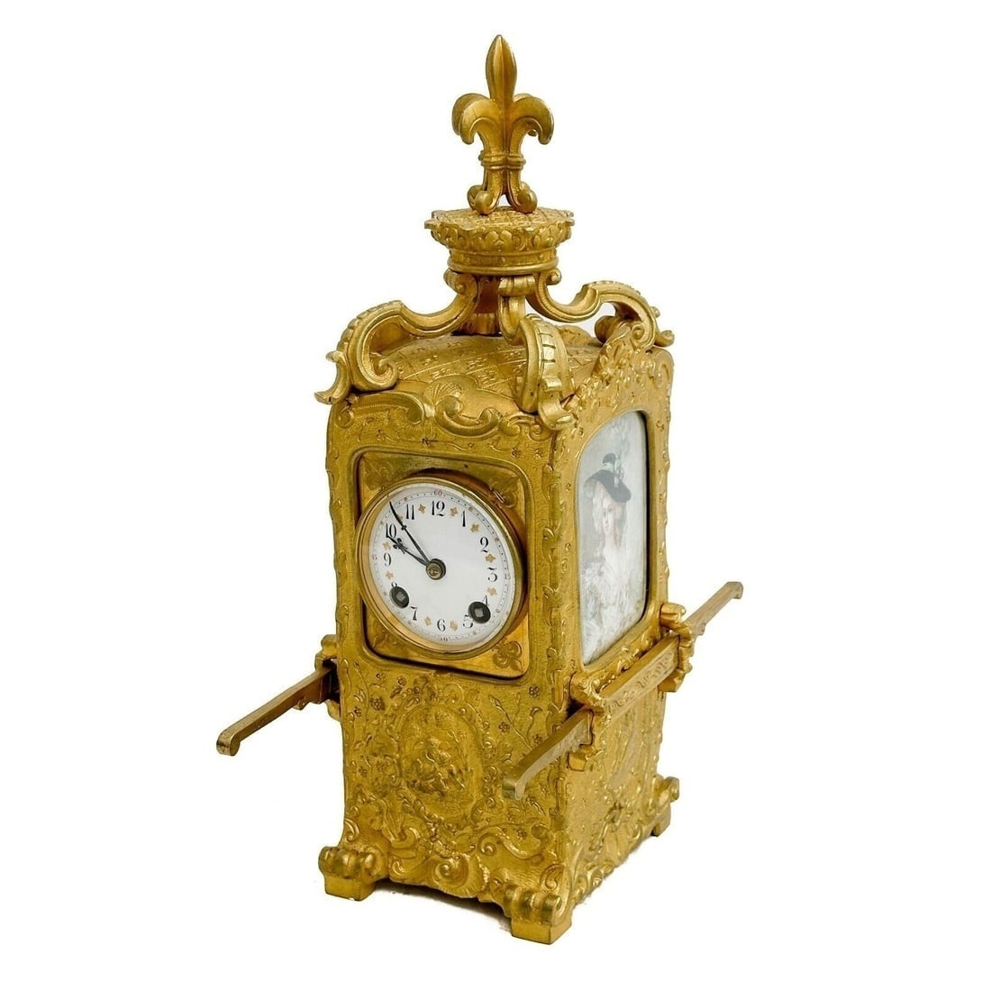 Tiffany & Co Sedan Chair Form Gilt Bronze Mantel Clock Watercolor Portraits: Tiffany & Co. Sedan Chair Form Gilt Bronze Mantel Clock, late 19th century. Hand painted watercolor portraits of women to the sides, artist signed to the edge of one. Interior of back door stamped Tif