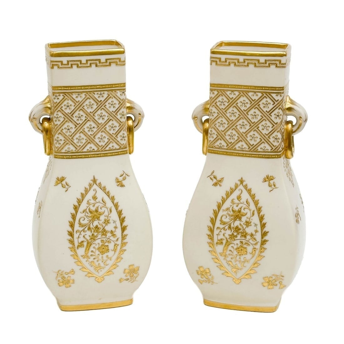 Pair Minton England Gilt Aesthetic Porcelain Vases 1887: Pair Minton England Gilt Aesthetic Porcelain Vases, 1887. A cream colored ground decorated with ornate gilt florals, silvered accents. Underside with Minton porcelain marks. Weight Approx., 4 lbs Meas