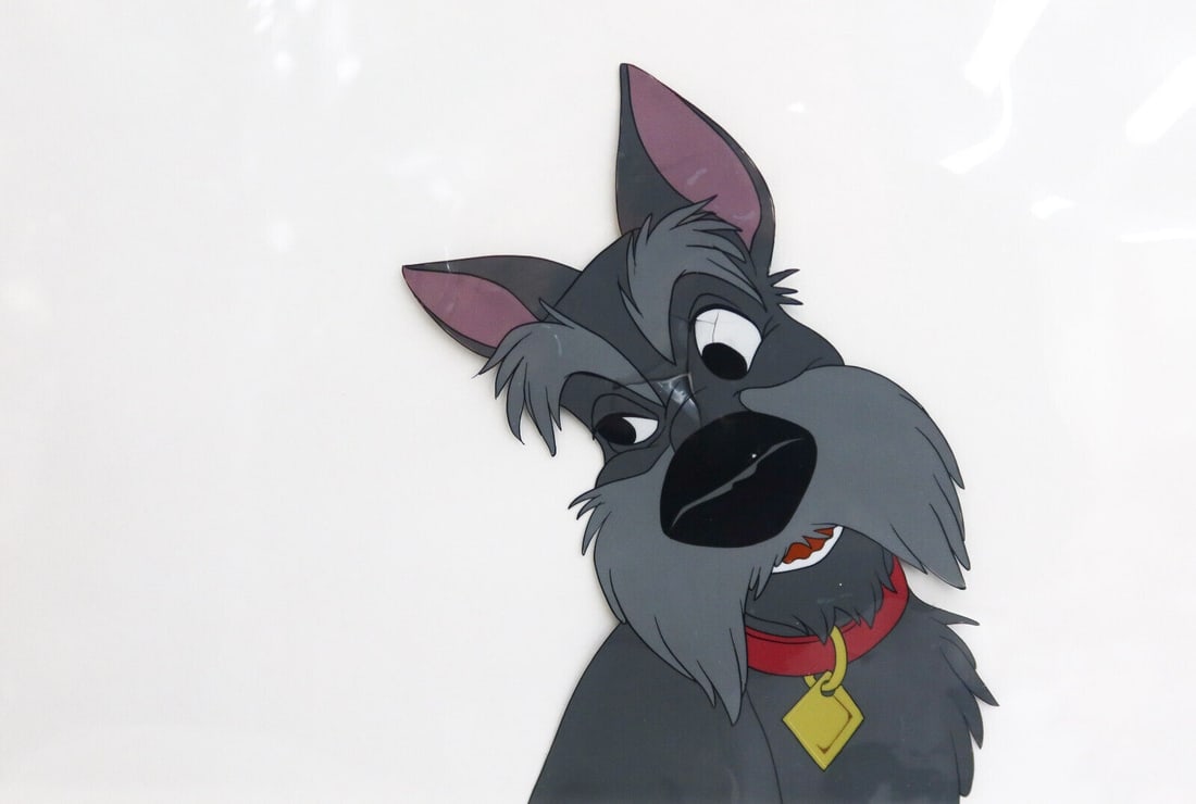 Animation Cel Walt Disney Production Lady and the Tramp Jock: Animation Cel Walt Disney Production Lady and the Tramp Jock. Mounted to red wooden frame Weight:approx. 3 lbs Measurements: Approx. Sight: 11.5 inches x 7.5 inches / Frame: 17.125 inches x 13 inches 