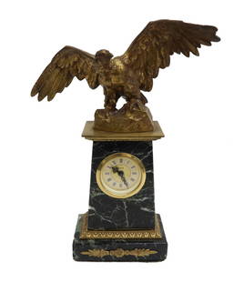 Mercedes German Gilt Bronze and Green Marble Eagle Table Clock, Early 20th C.: Mercedes German gilt bronze and green marble eagle table clock, Early 20th Century. Figural gilt bronze eagle to top of green marble base. Signed "Mercedes" and "Made in Germany" to face. Weight: Appr