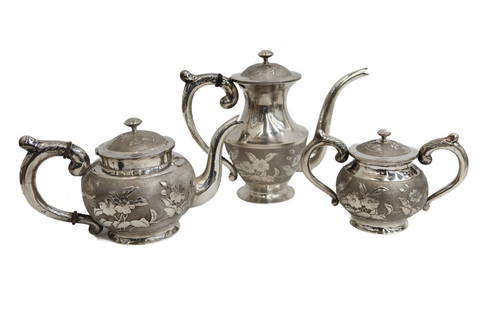 Tian Bao Chinese Silver 3 Piece Tea and Coffee Service, Late Qing Dynasty: Tian Bao Chinese silver 3 piece tea and coffee service, Late Qing Dynasty. Repousse flowers, fans, and cranes to central area with leaf handles. Tian Bao silver hallmarks to underside. Approximate