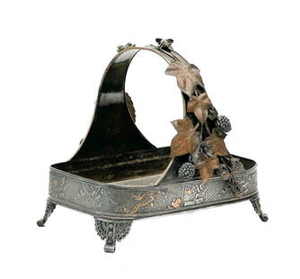 Meriden Brittania American Aesthetic Silver Plate Centerpiece Basket #1676 c1900: Meriden Brittania Co. American Aesthetic Design silver plate centerpiece basket #1676, circa 1900. Basket with applied leaf, cherry, berry, and insect decoration to the handle with copper and parcel