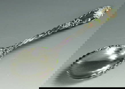 19th century Sterling Silver & Shaded Enamel Serving Spoon Gorham: 19th century Sterling Silver and Shaded Enamel Serving Spoon Gorham - Raised foliate scroll designs that continue onto the edge of the bowl of the spoon. Touches of enamel, Monogrammed. Weight: