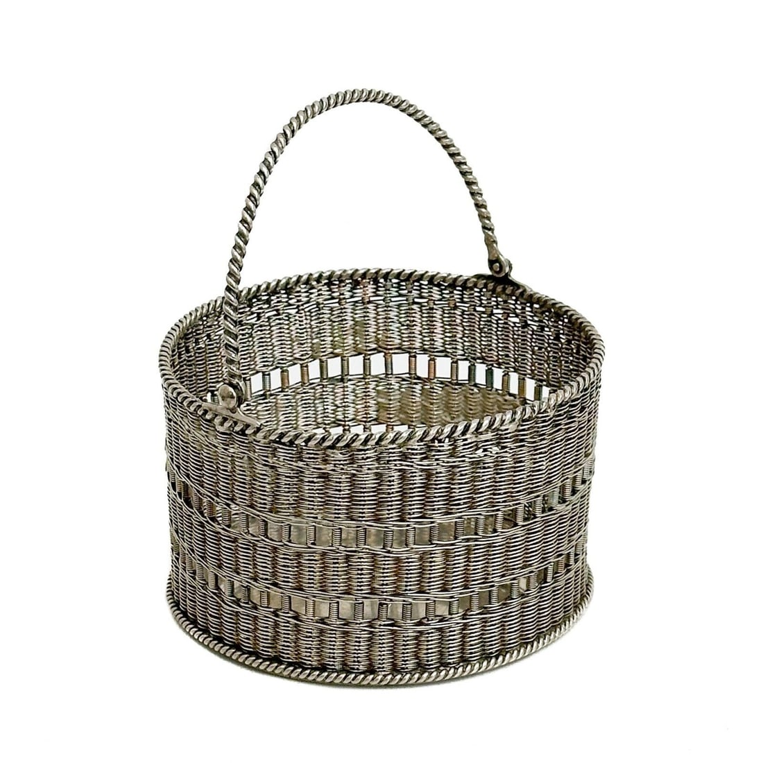 Dutch 833 Silver Reticulated Wine Bottle Coaster or Basket with Handle c 1900: Dutch 833 Silver Reticulated Wine Bottle Coaster or Basket with Handle, circa 1900. Handled basket. Underside marked with Lion Passant 2nd purity mark and Dutch Pseudo hallmarks. Weight: Approx. 6 ozt