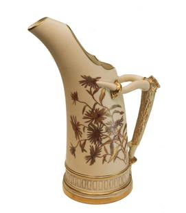Royal Worcester Porcelain Ivory 8" Tall Ewer #1117, 1888, Sunflowers: Royal Worcester porcelain blush 8" ewer #1117, 1888. Beautiful gilt sunflowers throughout. Royal Worcester mark to the underside dated to 1888. Weight Approx., 1 lb Measures Approx., 6.5 inches x