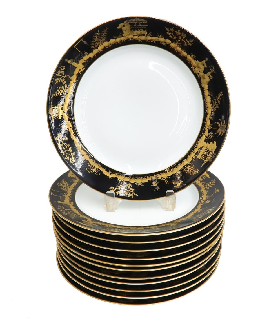 12 Tiffany & Co Le Tallec Paris Porcelain Dinner Plates in Nuits de Chine: 12 Tiffany & Co Le Tallec Paris porcelain dinner plates in Nuits de Chine (China Nights). Black ground with gilt Chinoiserie figures to rim. Underside marked Tiffany & Co. Le Tallec Paris with Musee d