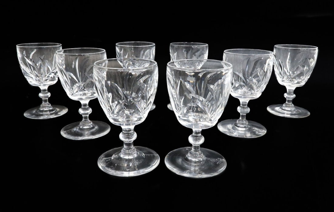 8 Steuben Art Glass WineGoblets in Leaves Signed: 8 Steuben art glass wine goblets in Leaves, Signed. Etched leaves throughout body. Marked "S" to underside. Weight: Approx. 10 lbs Measurements: Approx. 2.5 inches diameter x 4.6 inches tall Domestic