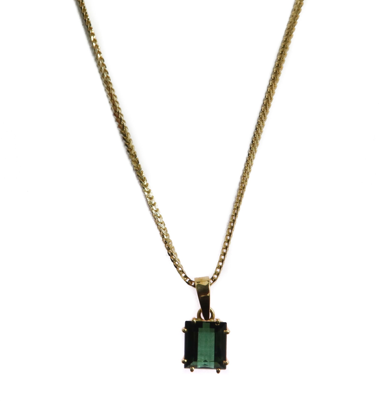 14k Yellow Gold Green Tourmaline Box Chain Necklace: 14k Yellow Gold Green Tourmaline Box Chain Necklace. Emerald cut green tourmaline measuring approximatley 9.2mm x 8mm x 4.5mm. Marked 14k to hook of emerald and to clasp. Weight Approx., 8.52 grams Me
