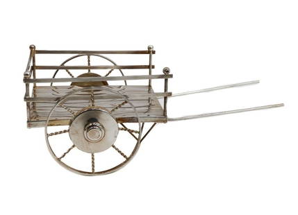 Cartier Sterling Silver Hand Made Model of a Wheel Barrow 20th Century: Cartier Sterling Silver Hand Made Model of a Wheel Barrow, 20th Century. Cartier sterling silver mark to edge. Weight: Approx. 4.66 ozt Measurements: Approx. 8.25 inches x 4 inches x 3.25 inches tall