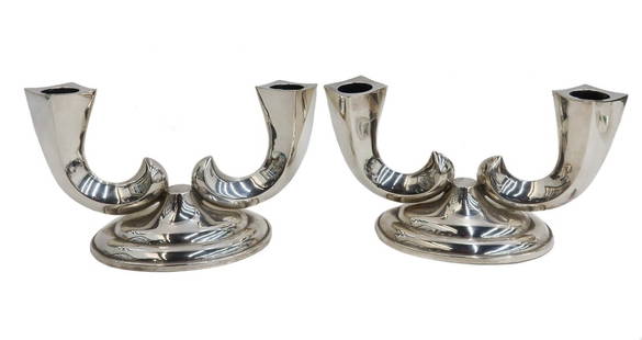 Pair Old Friend Weighted Sterling Silver Two Arm Candelabras 20th Century: Pair Old Friend weighted sterling silver two arm candelabras 20th Century. Modernist design with two curved horn arms mounted to oval weighted base. Signed "Sterling Old Friend" to underside. Weight: