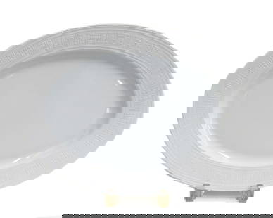 Hermes France Porcelain 14 inch Oval Serving Tray in Egee: Hermes France Porcelain 14 inch Oval Serving Tray in Egee. Embossed triangles and lines to rim. Hermes Egee mark to underside. Weight: Approx. 1 lb Measurements: Approx. 14.5 inches x 10.5 inches Cond