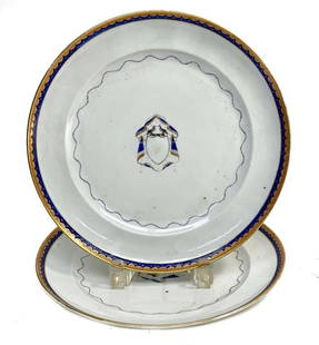 Pair Chinese Export Porcelain Armorial Dinner Plates, circa 1800: Pair Chinese Export hand painted porcelain armorial crest dinner plates, circa 1800. The center with a draped and bird armorial crest to the center. Swags to the inner rim with gilt to the outer edge.