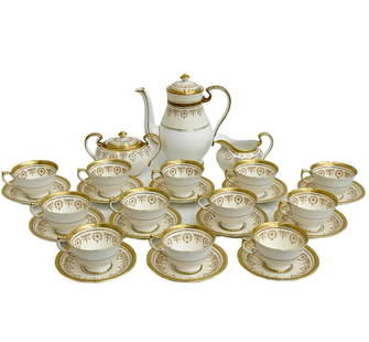 Aynsley England Porcelain Tea Service for 12 #7892 in Gold Dowery: Aynsley England Gilt Porcelain Tea Service for 12 in Gold Dowery. Service includes teapot, creamer, sugar bowl, and 12 cups and saucers. Underside marked Aynsley England Gold Dowery 7892. Weight: Appr