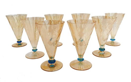 8 Steuben Orange Amber and Blue Luster Twisted Cocktail Goblets 20th Century: 8 Attributed to Steuben orange amber and blue luster cocktail glass goblets, 2nd quarter 20th century. Twisted texture to bowls of goblets. Pontil underside. Weight: Approx. 4 lbs Measurements:
