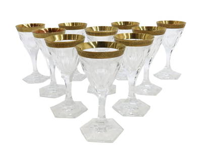 10 Moser Czech Cut Crystal Glass Cordial Wine Goblets in Adela Melikoff Signed: 10 Moser Czech cut crystal glass cordial wine goblets in Adela Melikoff, signed. Cut panel with gold trim with scrolls to mouth. Acid etched Moser mark to underside. Weight: Approx. 4 lbs