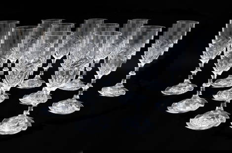 11 Lalique France Crystal Glass Champagne Flutes in Beauharnais Leaf Vine Signed: 11 Lalique France Crystal Glass champagne flutes in Beauharnais, Signed. Etched leaves to band of exterior bowl and base. Each signed "Lalique France" to underside edge. Weight: Approx. 9 lbs Measurem