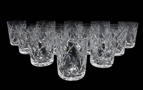 12 Tiffany & Co Cut Glass Double Old Fashioned Goblets in Trellis Signed: 12 Tiffany & Co. cut glass double old fashioned goblets in Trellis. Cut glass stars and diamonds to exterior. Starburst design to underside. Each acid etched "Tiffany & Co." To underside edge. Weight: