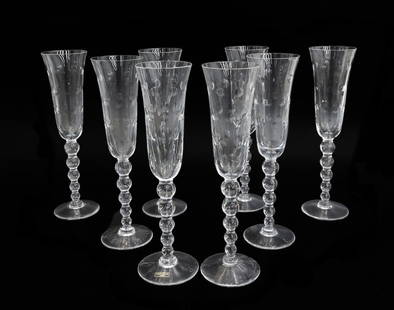 8 Saint (St) Louis France Cut Glass Champagne Flute Goblets in Bubbles Clear: 8 Saint (St) Louis France cut glass champagne goblets in Bubbles Clear. Cut dots to bowl with a graduated bubble stem. Each with acid etched Saint Louis mark to pontil underside and one with original