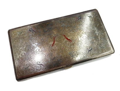 Cartier Silverplate and Enamel Cigarette Case: Cartier Silverplate and Enameedl Cigarette Case in the Persian style. Ornate chased Oriental birds and elephants with leaf accents throughout. Blue and red enamel remnants to birds. Sgined "Cartier" t