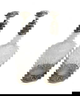 Pair French Silver and Acid Etched Glass Decanters, circa 1900. Etched Leaves: Pair French silver and acid etched glass decanters, circa 1900. Etched leaves throughout the body with foliate scrolls to the silver overlay areas. French silver minerva mark to neck. Weight: Approx.