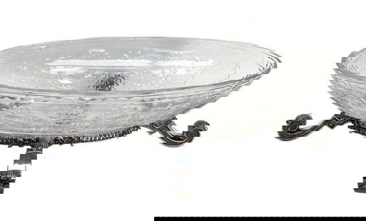 Cut Glass Centerpiece Bowl with Silverplate Stand, circa 1900: Cut glass centerpiece bowl silverplate stand, circa 1900. Etched laurel leaves and florals to the exterior. Scrolled to the silverplate feet. Unknown maker mark hallmark to one of the feet- Likely Eng