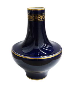 Manufacture de Sevres Cobalt Blue and Gilt Porcelain Miniature Vase 1903: Manufacture de Sevres cobalt blue and gilt porcelain miniature vase 1903. Cobalt blue ground with gilt to the circular bands and a gilt floral design to neck. Sevres mark to underside for 1903 and 192