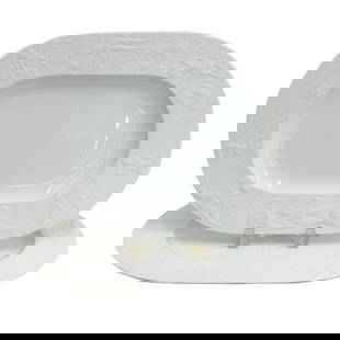 Pair Rosenthal Germany Porcelain 16 inch Oval Serving Platters Magic Flute White: Pair Rosenthal Germany Porcelain 16 inch Oval Serving Platters. White porcelain with embossed figures around the exterior with a matte finish. Underside marked Rosenthal Germany, Bijorn Wiinblad. Weig