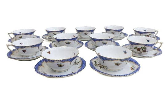 11 Herend Hungary Porcelain Cup and Saucers in Rothschild Bird Blue Border, 1948: 11 Herend Hungary Porcelain Cup and Saucers in Rothschild Bird Blue Border, 1948. A blue fish scale border in blue with various hand painted birds and butterflies throughout. Herend Hungary mark to th