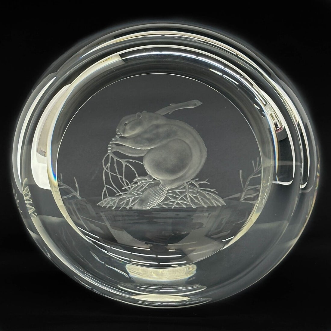 Steuben Art Glass Engraved Beaver Roundel Sculpture Limited Edition 20: Steuben Art Glass Engraved Beaver Roundel. After a 1979 design by James Houston. Depicts a beaver to the center. Underside signed Steuben. From a reported limited edition of 20, apparently unnumbered