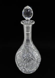 Baccarat France Cut Crystal Glass Decanter in Lagny, Signed: Baccarat France cut crystal glass decanter in Lagny, Signed. Elaborate cut star designs to exterior. Acid etched Baccarat mark to base. Weight: Approx. 4 lbs Measurements: Approx. 5.25 inches diameter