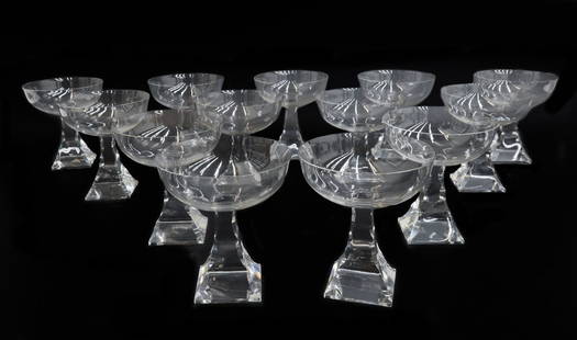 13 Baccarat France Crystal Glass Champagne Saucers in Maladetta Signed: 13 Baccarat France crystal glass champagne saucers in Maladetta Signed. Square base with a curved ridged stopper to stem. Acid etched Baccarat mark to underside. Weight: Approx. 10 lbs Measurements: A