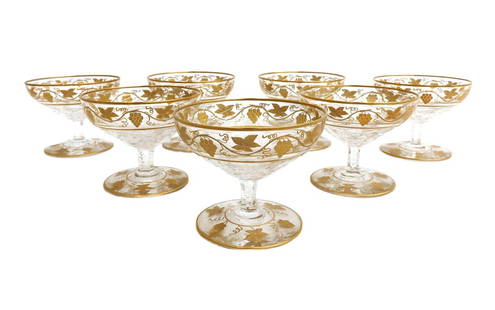 7 Val Saint Lambert Champagne Sherbet Coupes in Pampre D' Or: 7 Val Saint Lambert champagne sherbet coupes in Pampre D' Or. Gold encrusted leaves and grapes to the top and base rims. Pontil underside. Unsigned, but mark of Val Saint Lambert Weight: Approx. 3 lbs