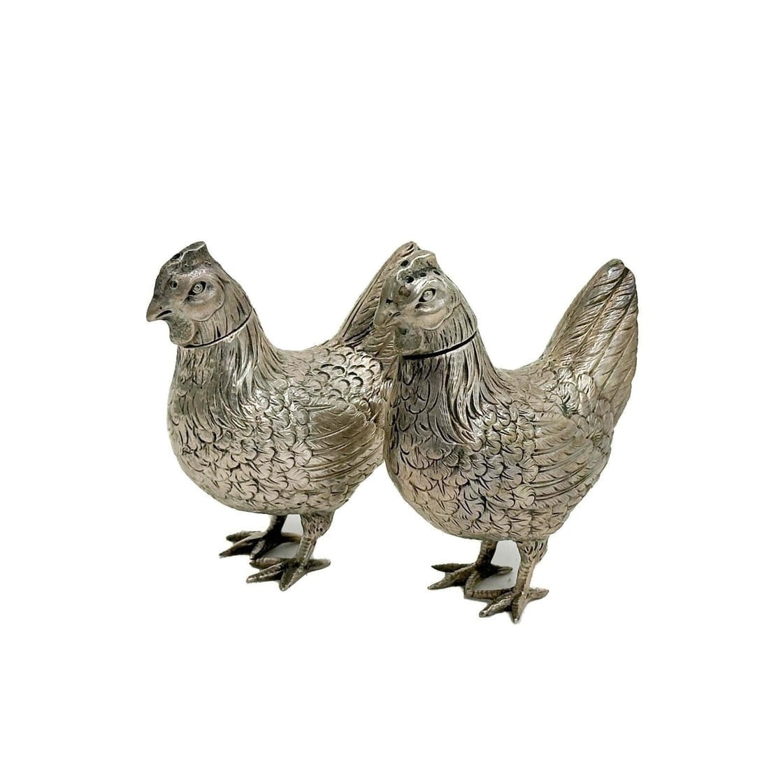 Pair Bruckmann & Sohne German 800 Silver Chicken Salt Pepper Shakers: Pair German 800 Silver Chicken Form Salt Pepper Shakers. Interior of neck marked Germany, with German 800 silver marks, probably Bruckmann & Sohne Weight: Approx. 3 ozt Measurements: Approx. 2 inches