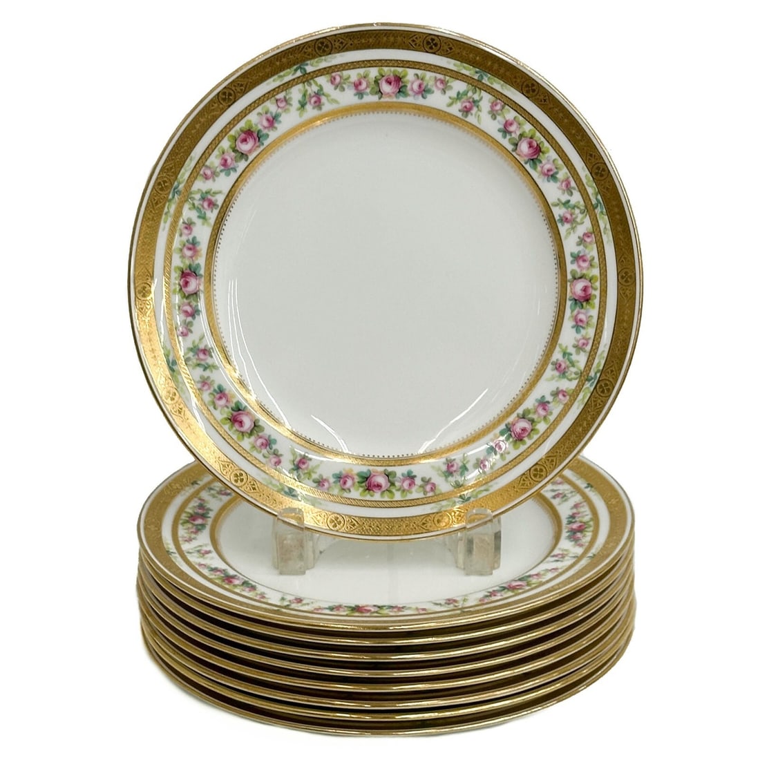 9 Minton England for Tiffany & Co Porcelain Dessert Plates: 9 Minton England for Tiffany & Co Porcelain Dessert Plates. Hand painted floral decoration to the edge, gilt accents. Underside with Minton England Tiffany & Co marks Weight: Approx. 8.5 lbs Measureme